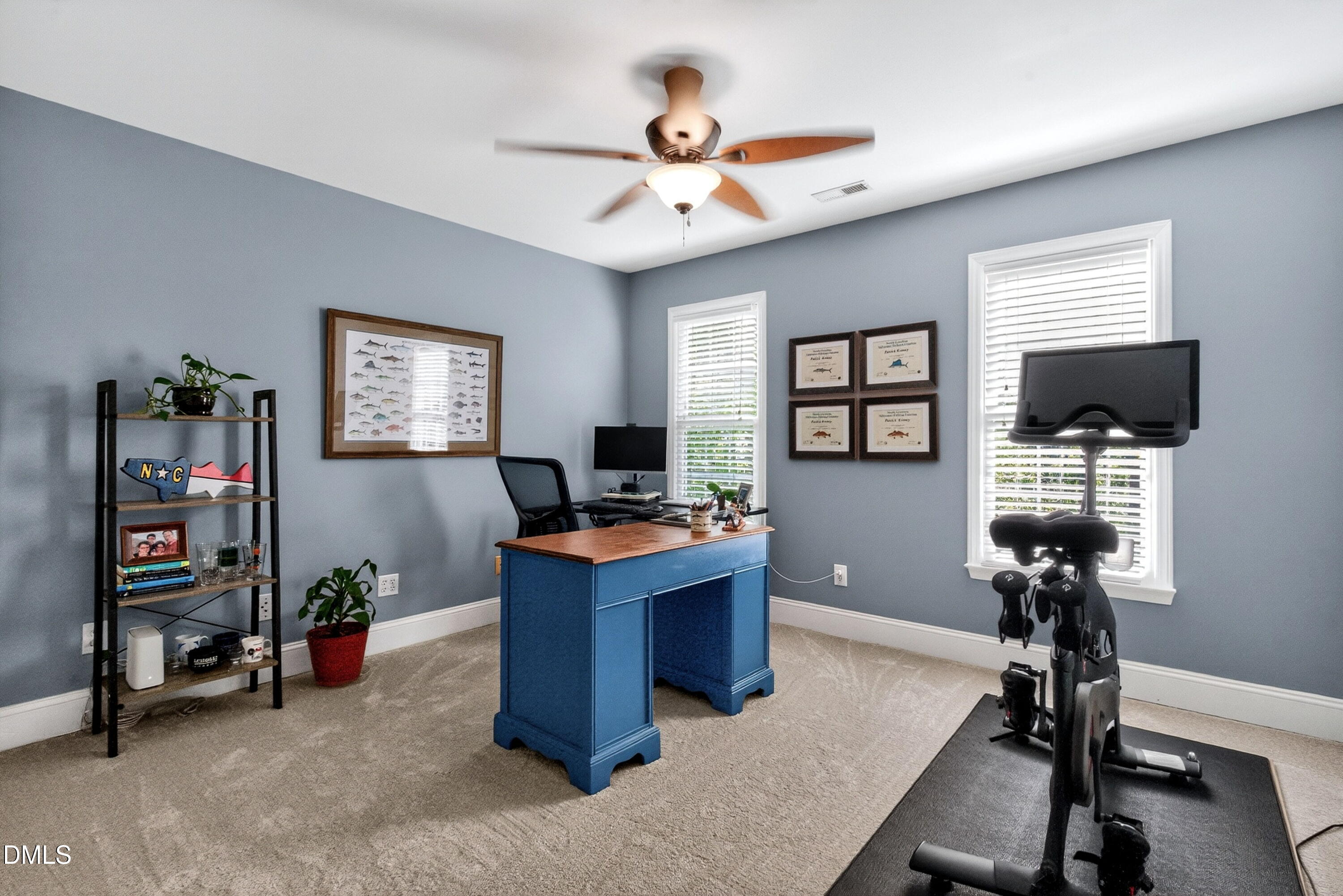 6329 Battleview Drive Raleigh, NC 27613 - Photo 26 of 36 a view of a workspace with furniture and a window