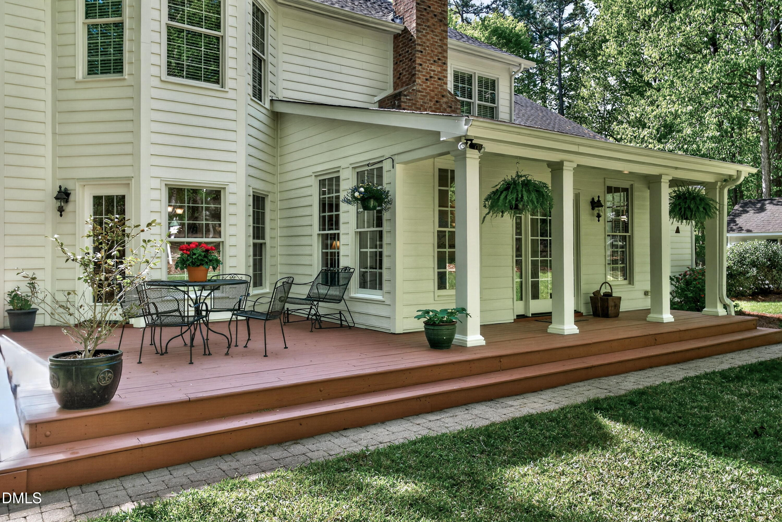 6329 Battleview Drive Raleigh, NC 27613 - Photo 30 of 36 a front view of a house with porch and garden