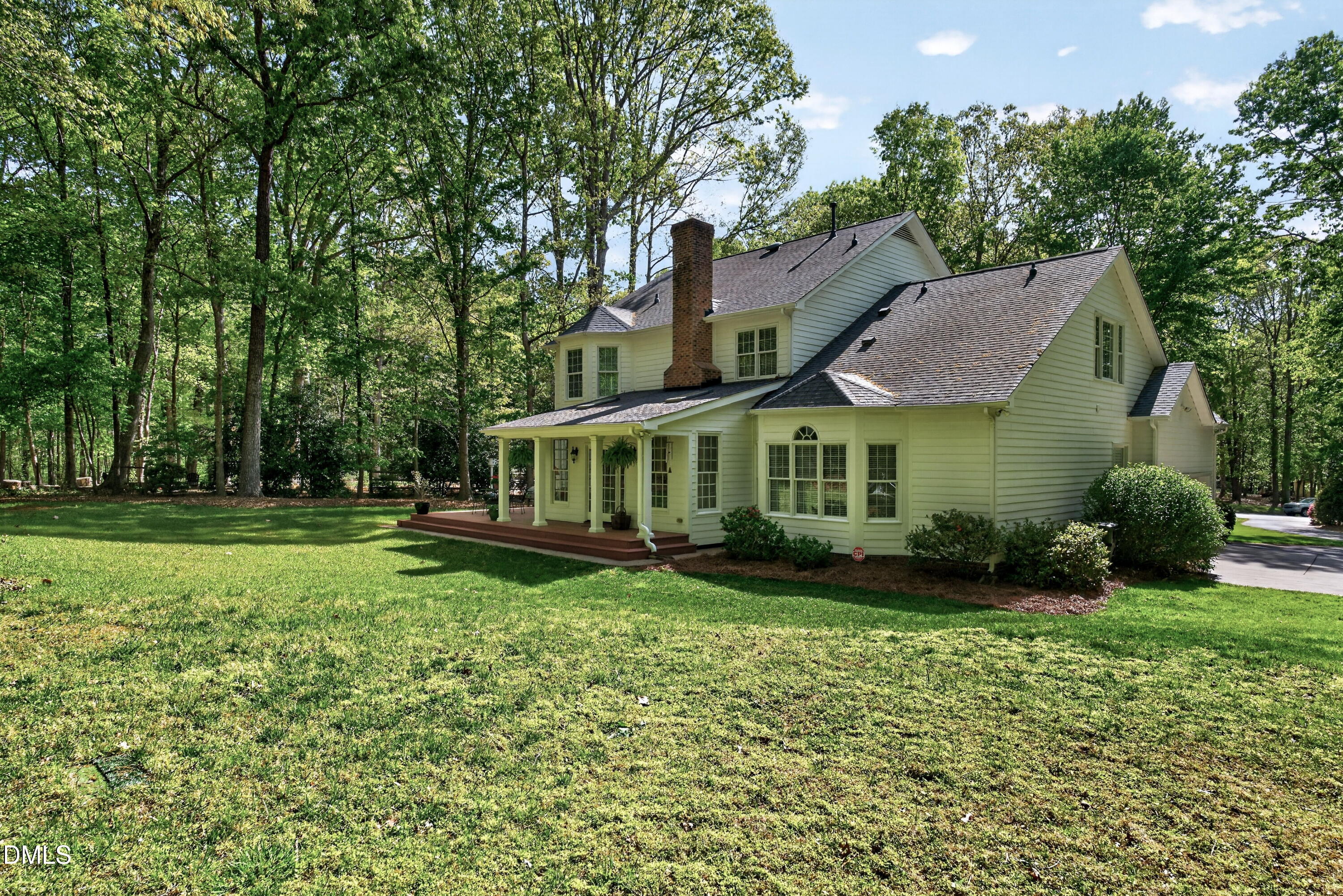 6329 Battleview Drive Raleigh, NC 27613 - Photo 33 of 36 a view of a house with a yard and sitting area