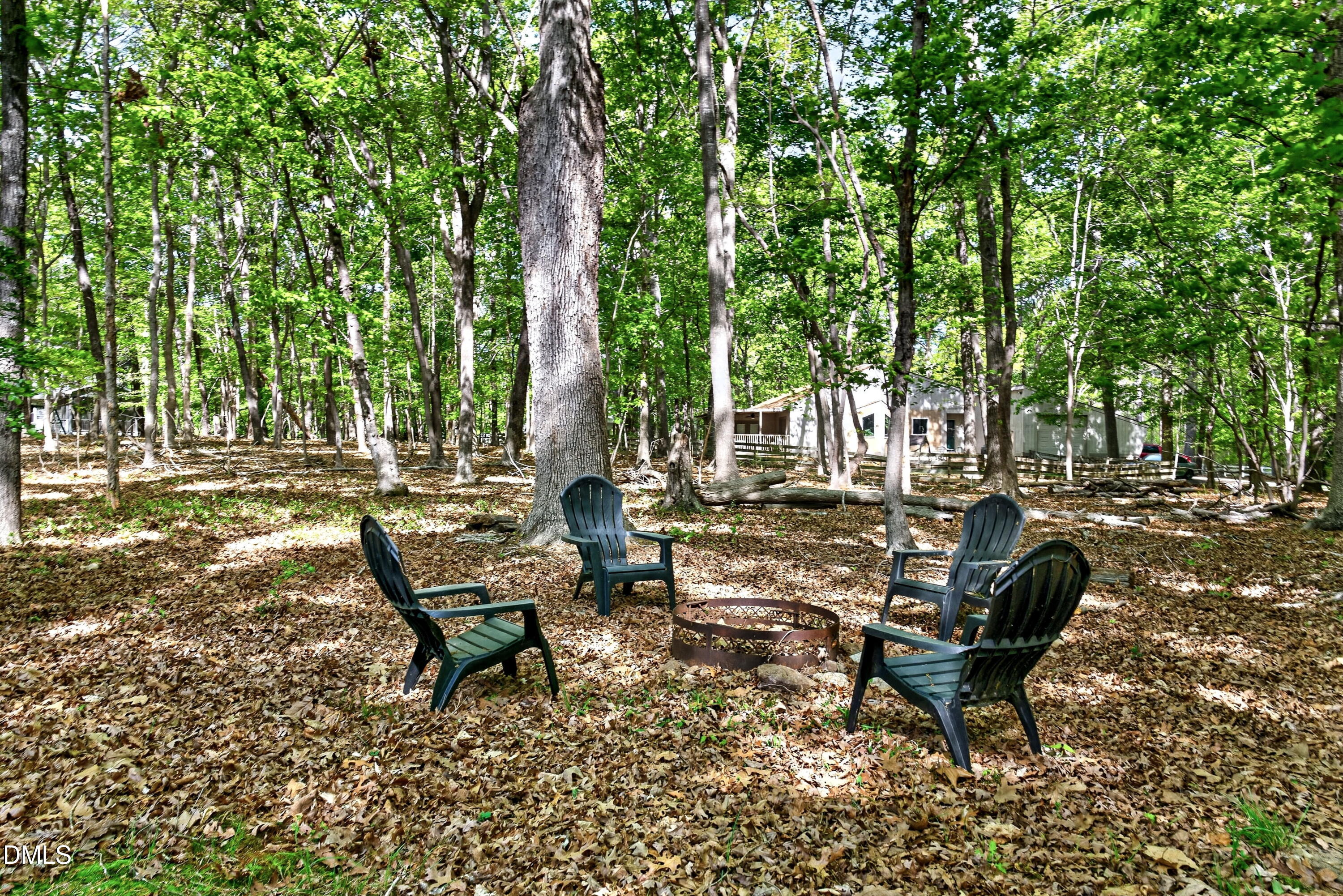 6329 Battleview Drive Raleigh, NC 27613 - Photo 34 of 36 a view of a lake with outdoor seating