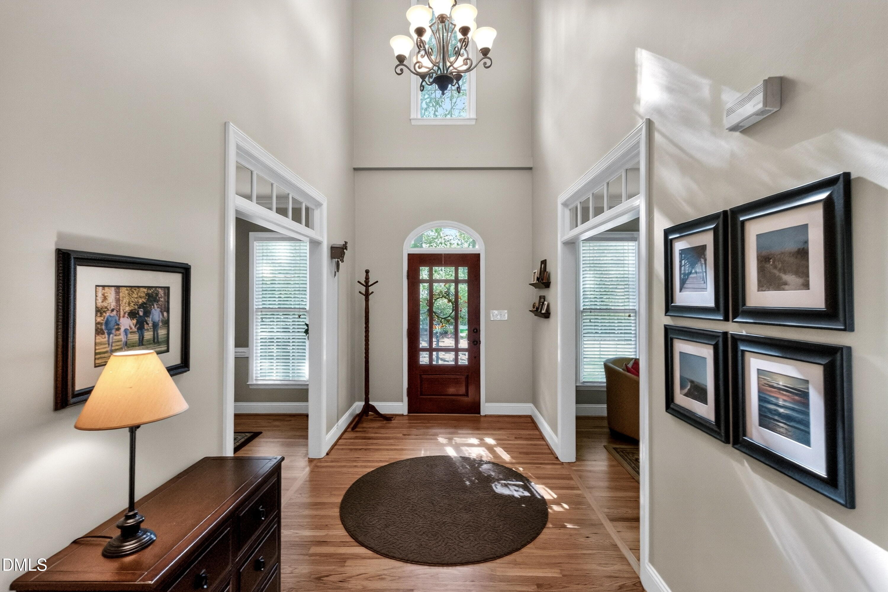 6329 Battleview Drive Raleigh, NC 27613 - Photo 4 of 36 a view of a livingroom with furniture and chandelier
