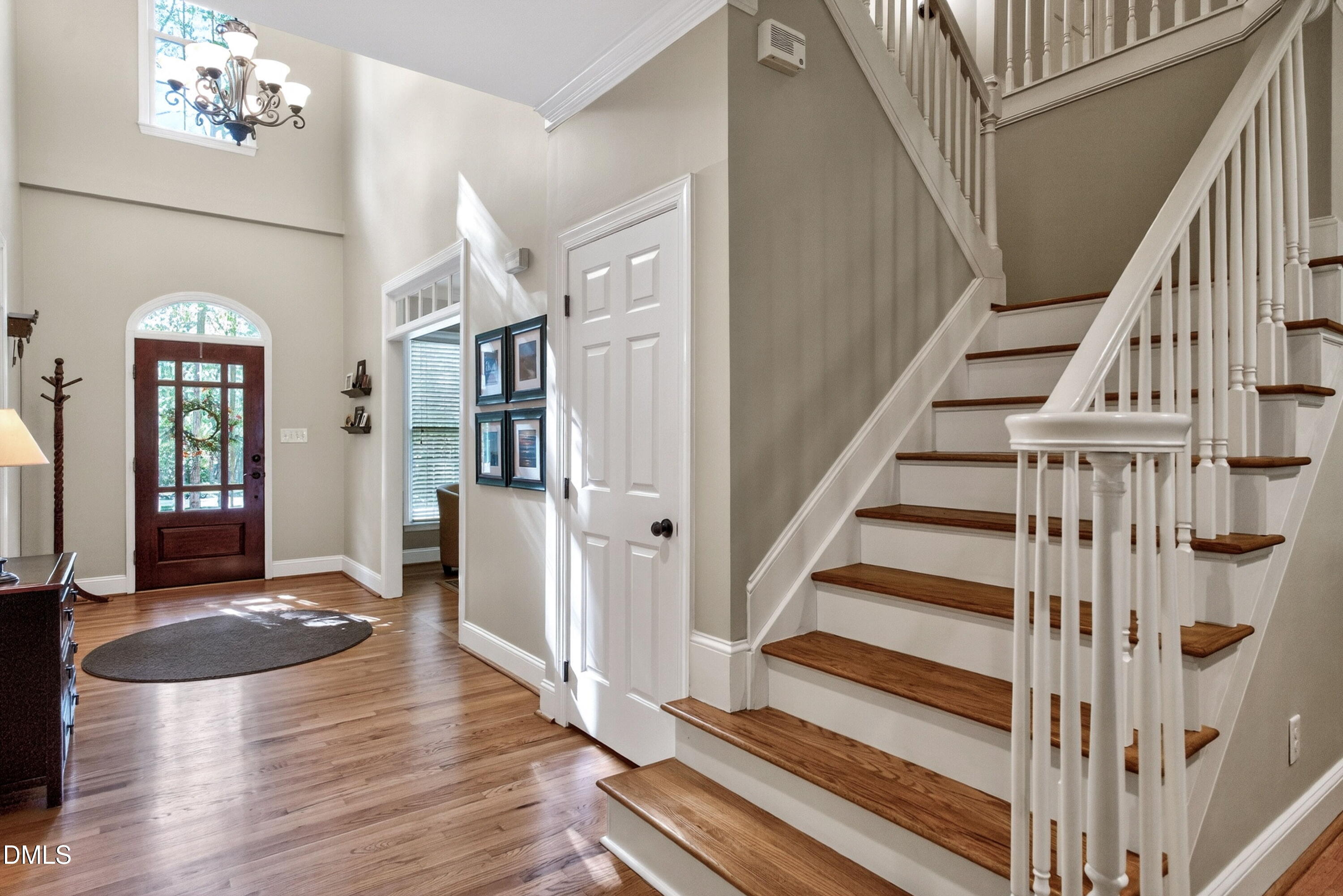 6329 Battleview Drive Raleigh, NC 27613 - Photo 5 of 36 a view of entryway and hall with wooden floor