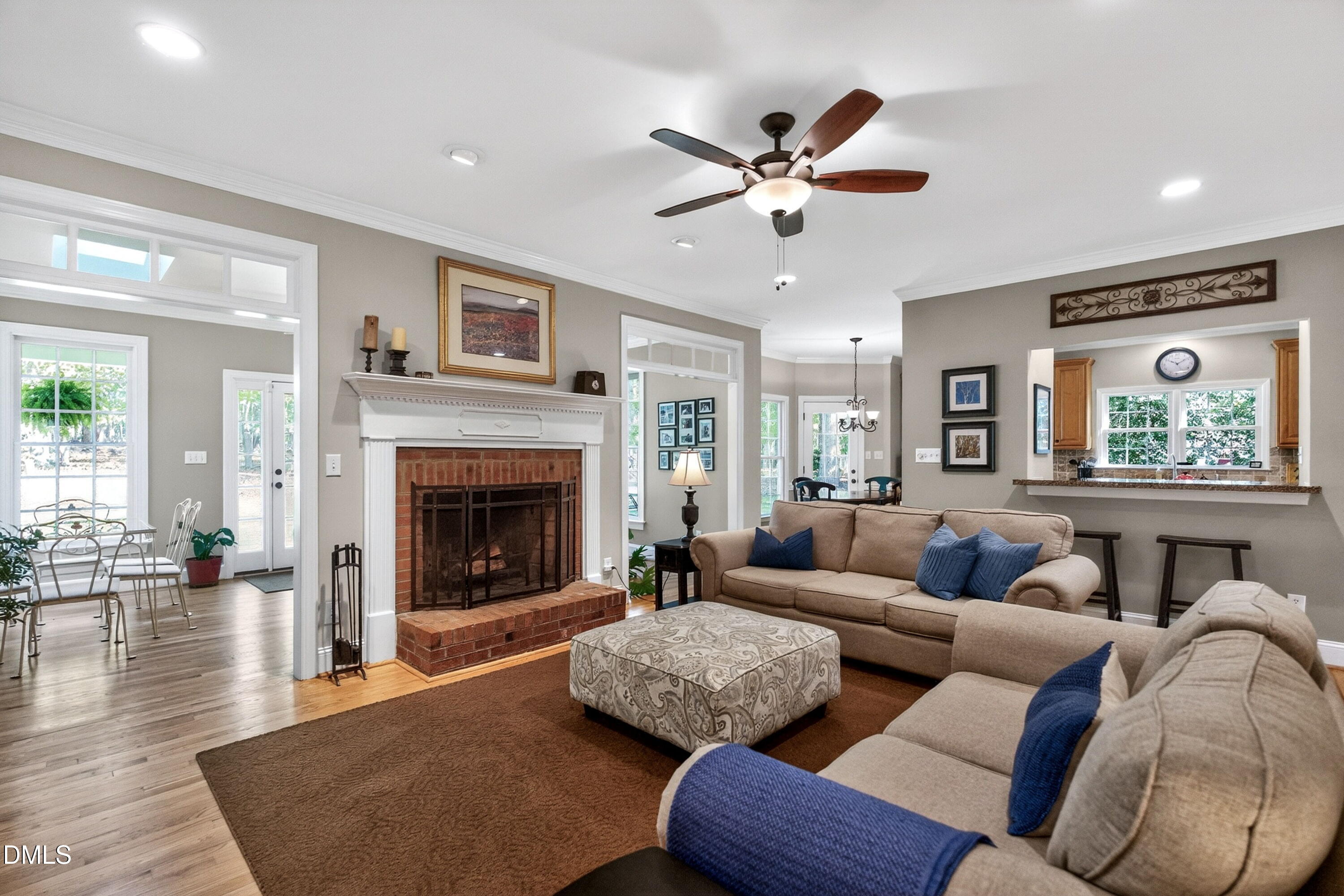 6329 Battleview Drive Raleigh, NC 27613 - Photo 8 of 36 a living room with furniture and a fireplace