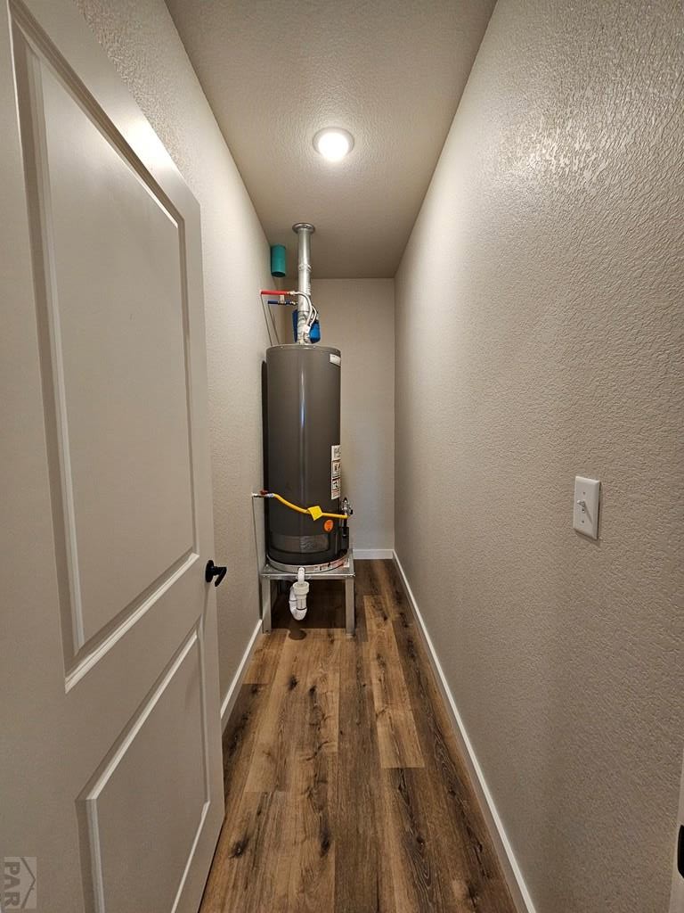 28655 County Road 24.6 Springfield, CO 81073 - Photo 12 of 19 a view of hallway with wooden floor and chair