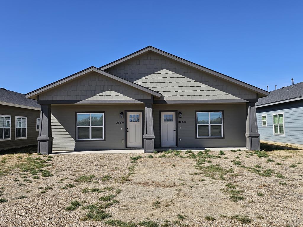 28655 County Road 24.6 Springfield, CO 81073 - Photo 16 of 19 a front view of a house with a yard