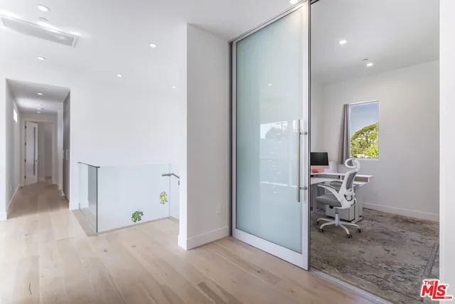 a utility room with sink dryer and washer