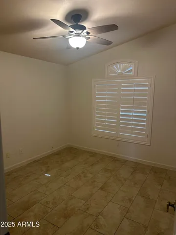 a bathroom with a sink toilet and mirror