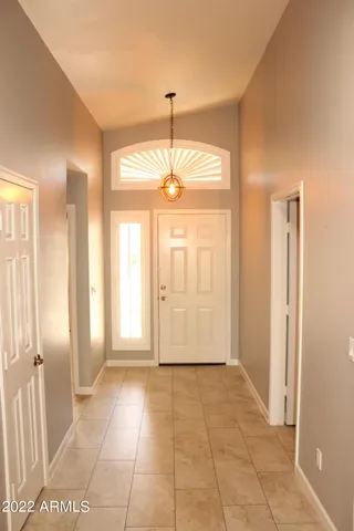 a view of a room with large windows