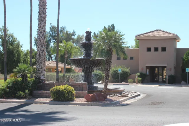 a view of swimming pool with outdoor seating