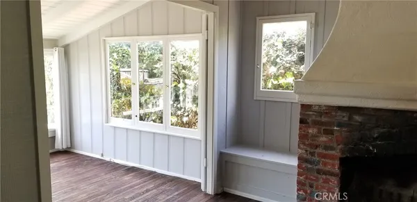 a view of empty room with windows
