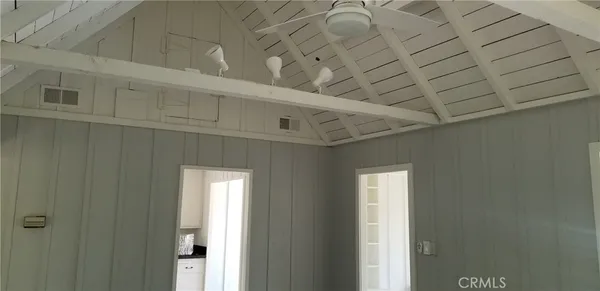 a kitchen with a sink and a refrigerator
