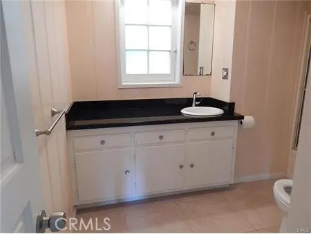 a potted plant sitting in front of a building