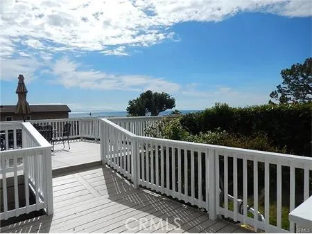 a view of a balcony with an outdoor space