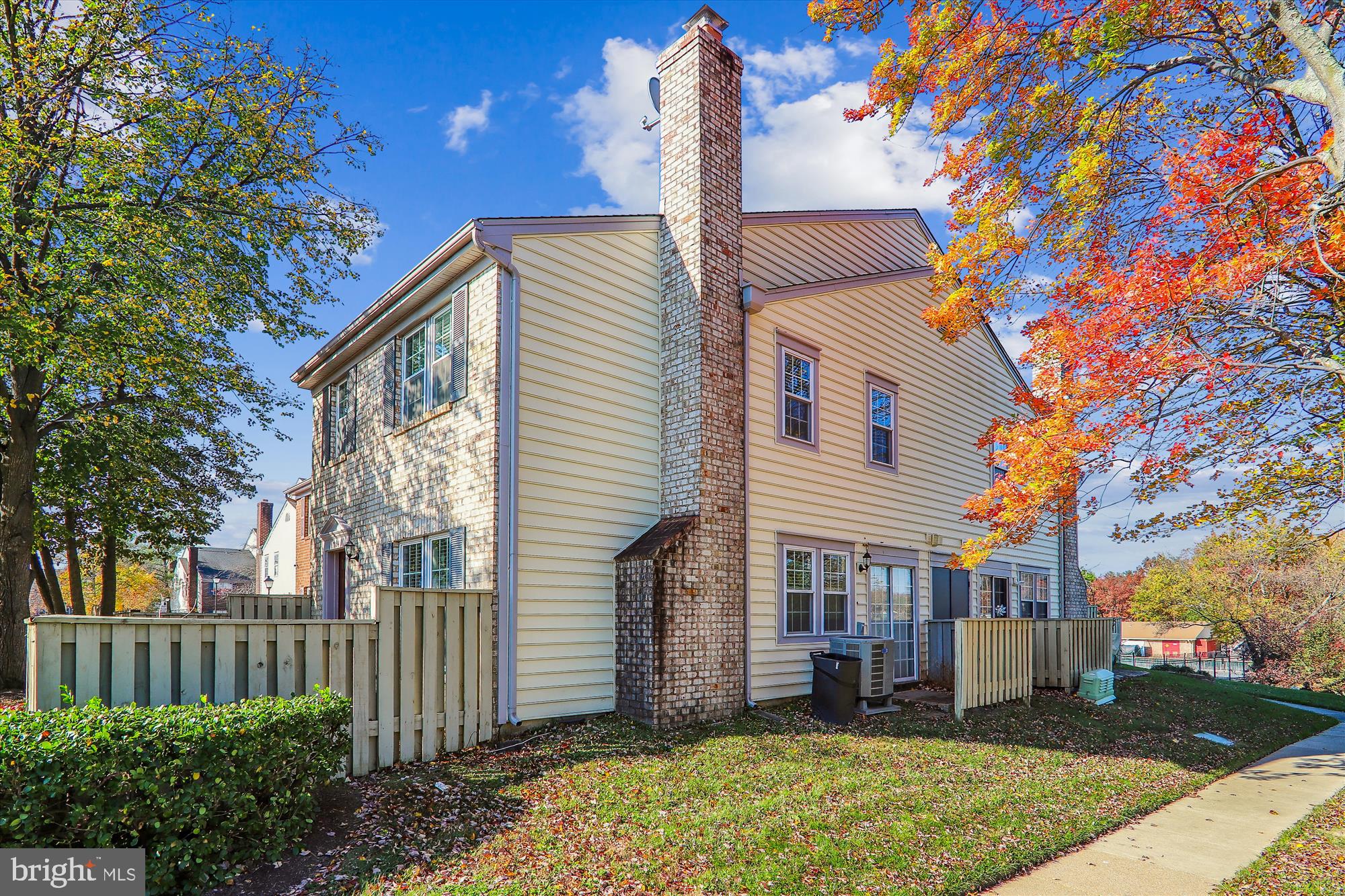 13164 Musicmaster Drive, Unit 144 Silver Spring, MD 20904 - Photo 18 of 31 a front view of a house with a yard