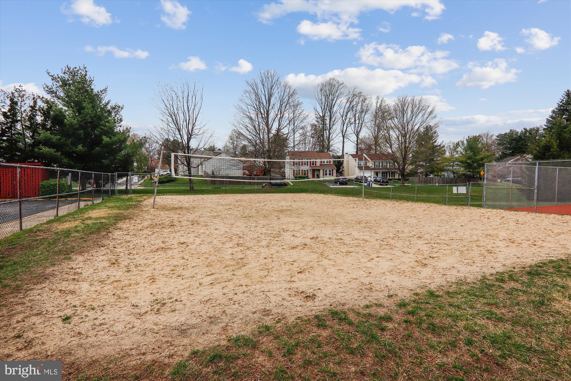 13164 Musicmaster Drive, Unit 144 Silver Spring, MD 20904 - Photo 23 of 31 a view of a swimming pool with an outdoor seating and a yard