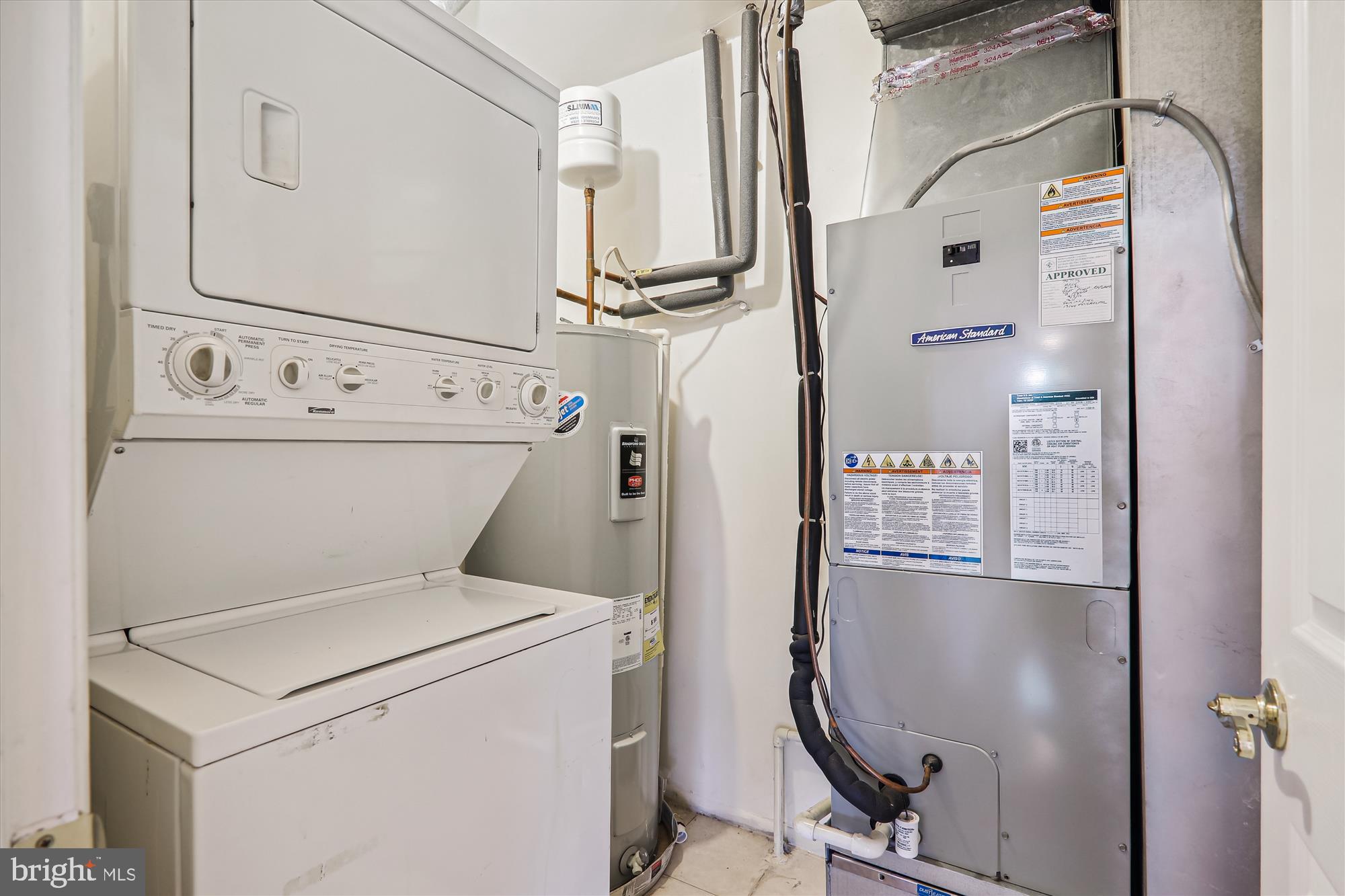 13164 Musicmaster Drive, Unit 144 Silver Spring, MD 20904 - Photo 24 of 31 a utility room with dryer and washer