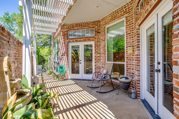 a view of a balcony with couch