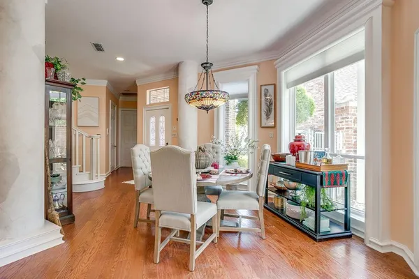 a dining room with furniture window wooden floor