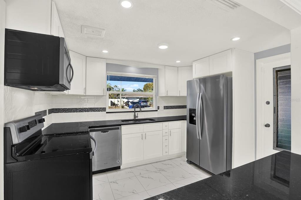 7902 Canna Drive Port Richey, FL 34668 - Photo 11 of 24