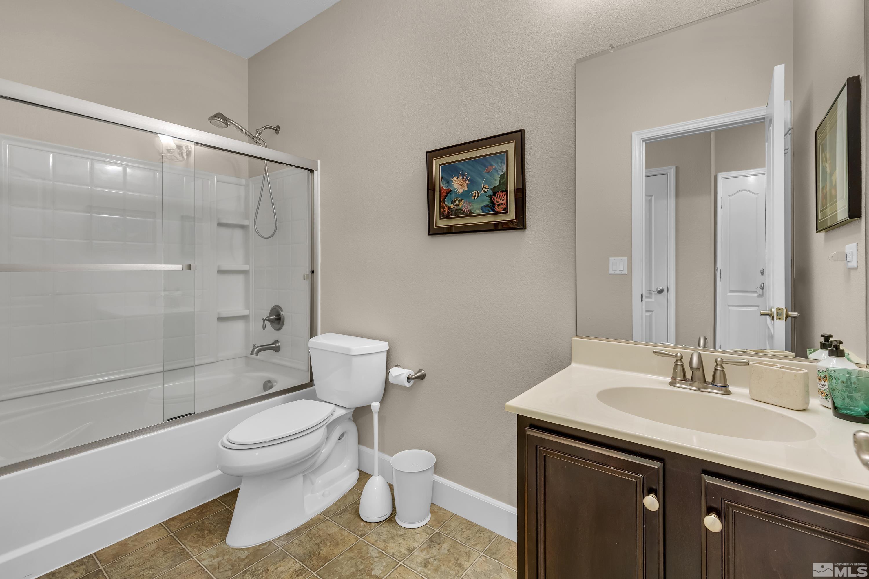 420 Manciano Way Reno, NV 89521 - Photo 22 of 30 a bathroom with a sink toilet and shower