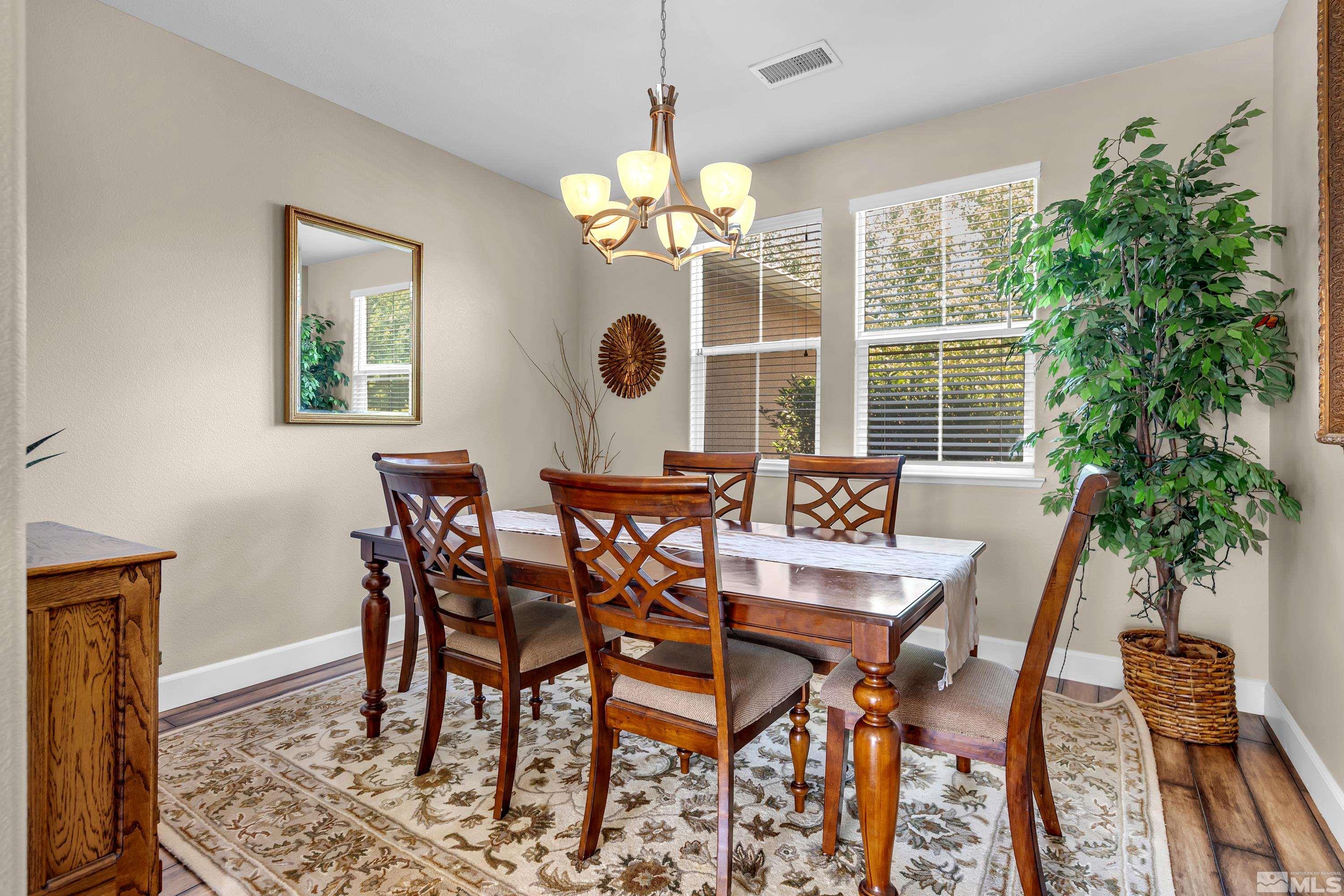 420 Manciano Way Reno, NV 89521 - Photo 8 of 30 a view of a dining room with furniture and window