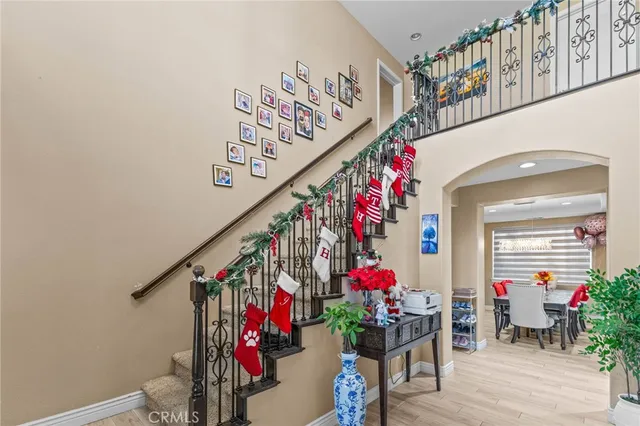 a view of dining room with furniture and front door