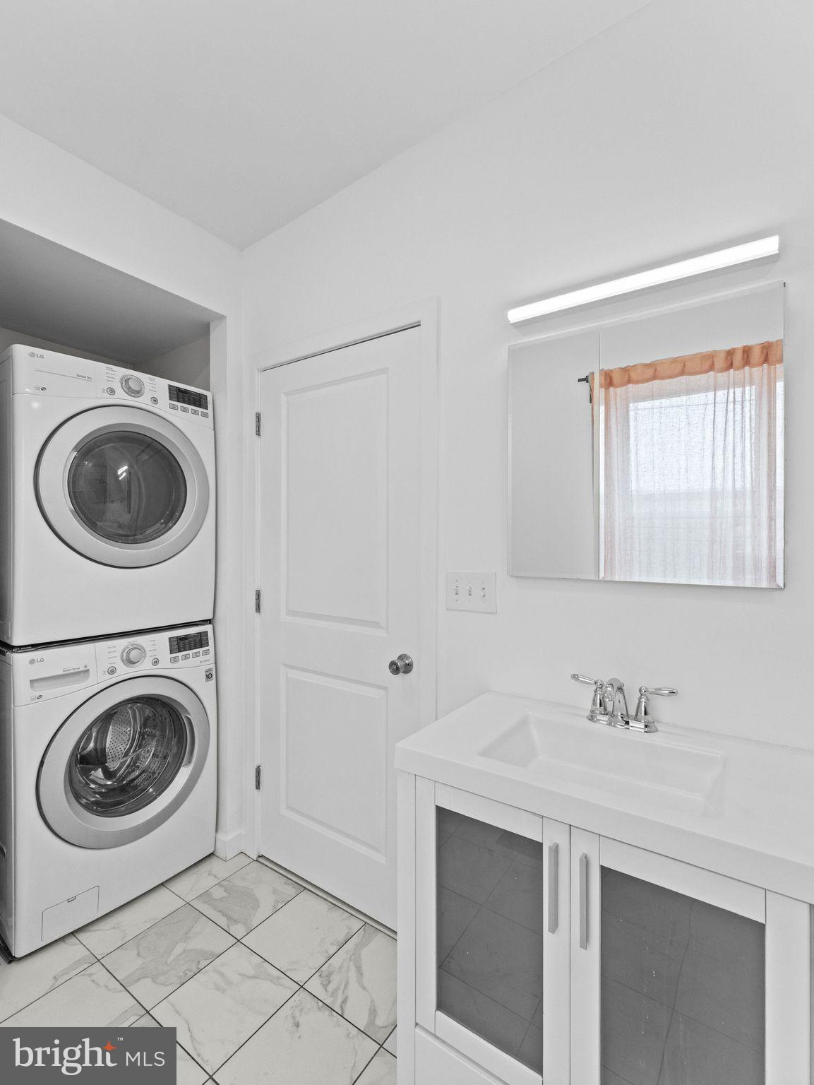 2558 Cedar Street Philadelphia, PA 19125 - Photo 26 of 38 Laundry // Primary Bathroom