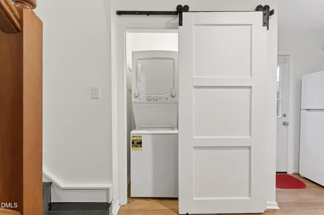 a bathroom with a glass shower door