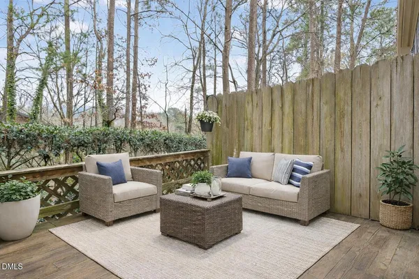 a outdoor living space with furniture and garden view