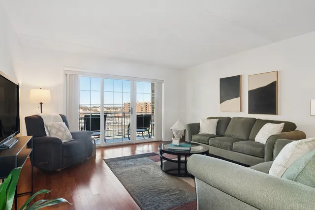 a bathroom with a double vanity sink toilet and shower