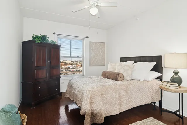 a balcony view with a large window