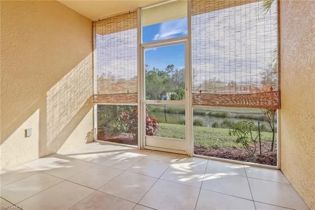 a view of a glass door and the window