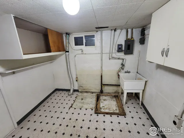 a view of a hallway with seating area