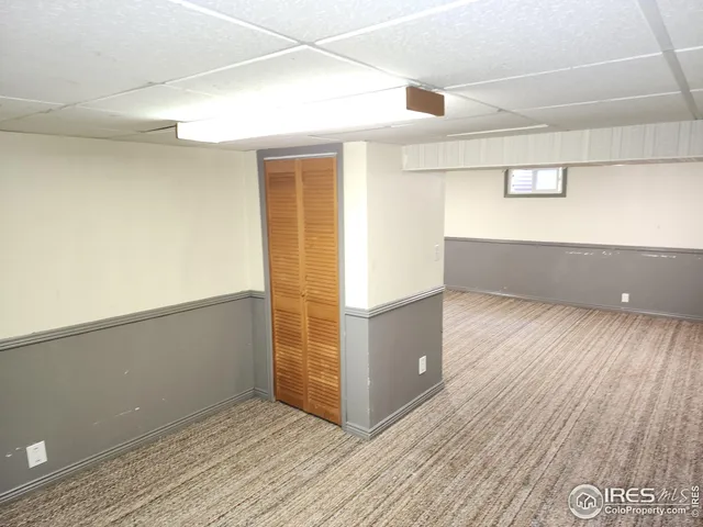 a view of kitchen and wooden floor