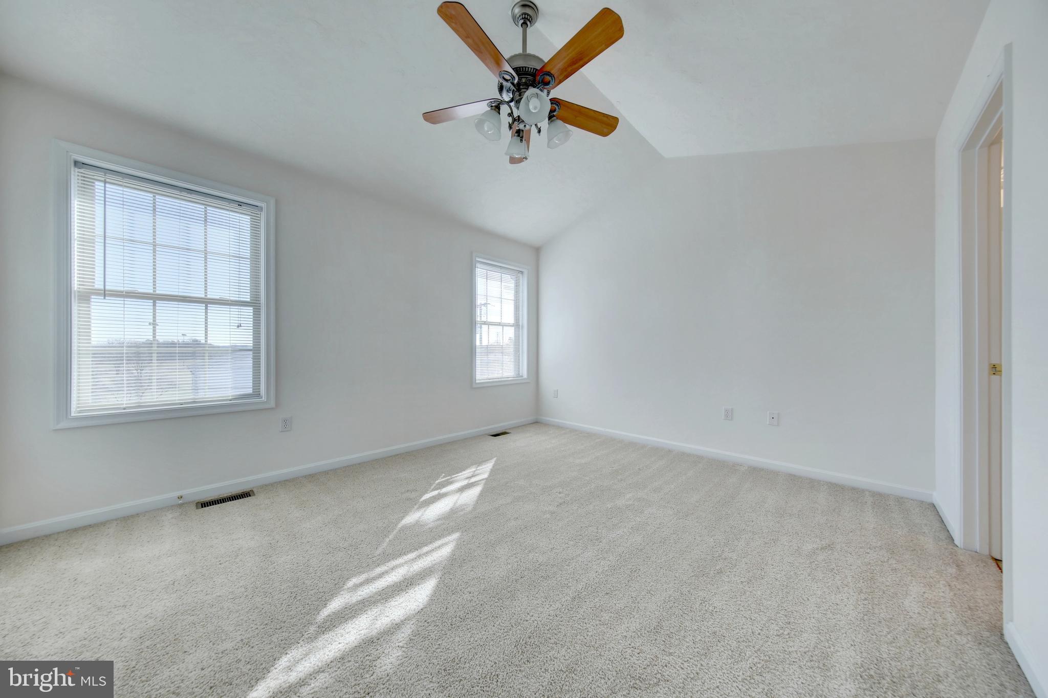 689 East Walnut Street Hanover, PA 17331 - Photo 22 of 31 an empty room with windows and fan