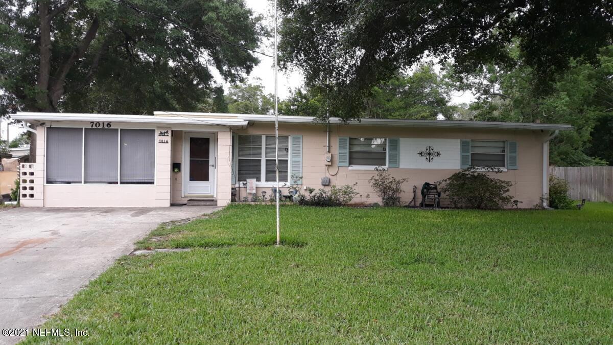 7016 Oakney Road Jacksonville, FL 32211 - Photo 1 of 16 front view of a house with a yard