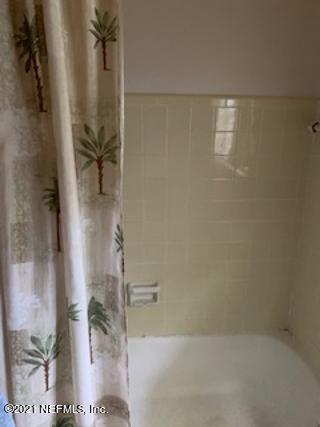 7016 Oakney Road Jacksonville, FL 32211 - Photo 16 of 16 a bathroom with a shower