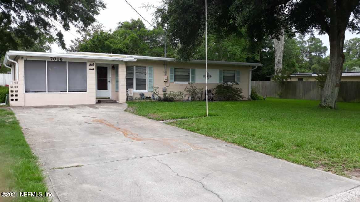 7016 Oakney Road Jacksonville, FL 32211 - Photo 2 of 16 front view of a house with a yard and trees