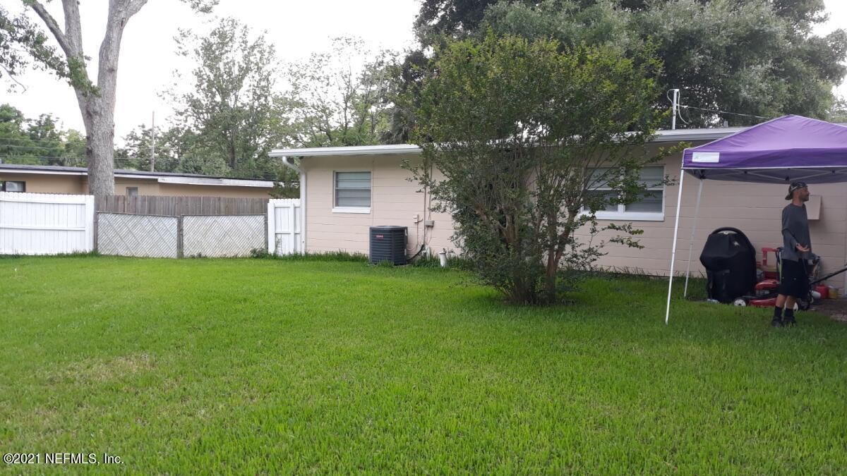 7016 Oakney Road Jacksonville, FL 32211 - Photo 3 of 16 a view of a house with backyard