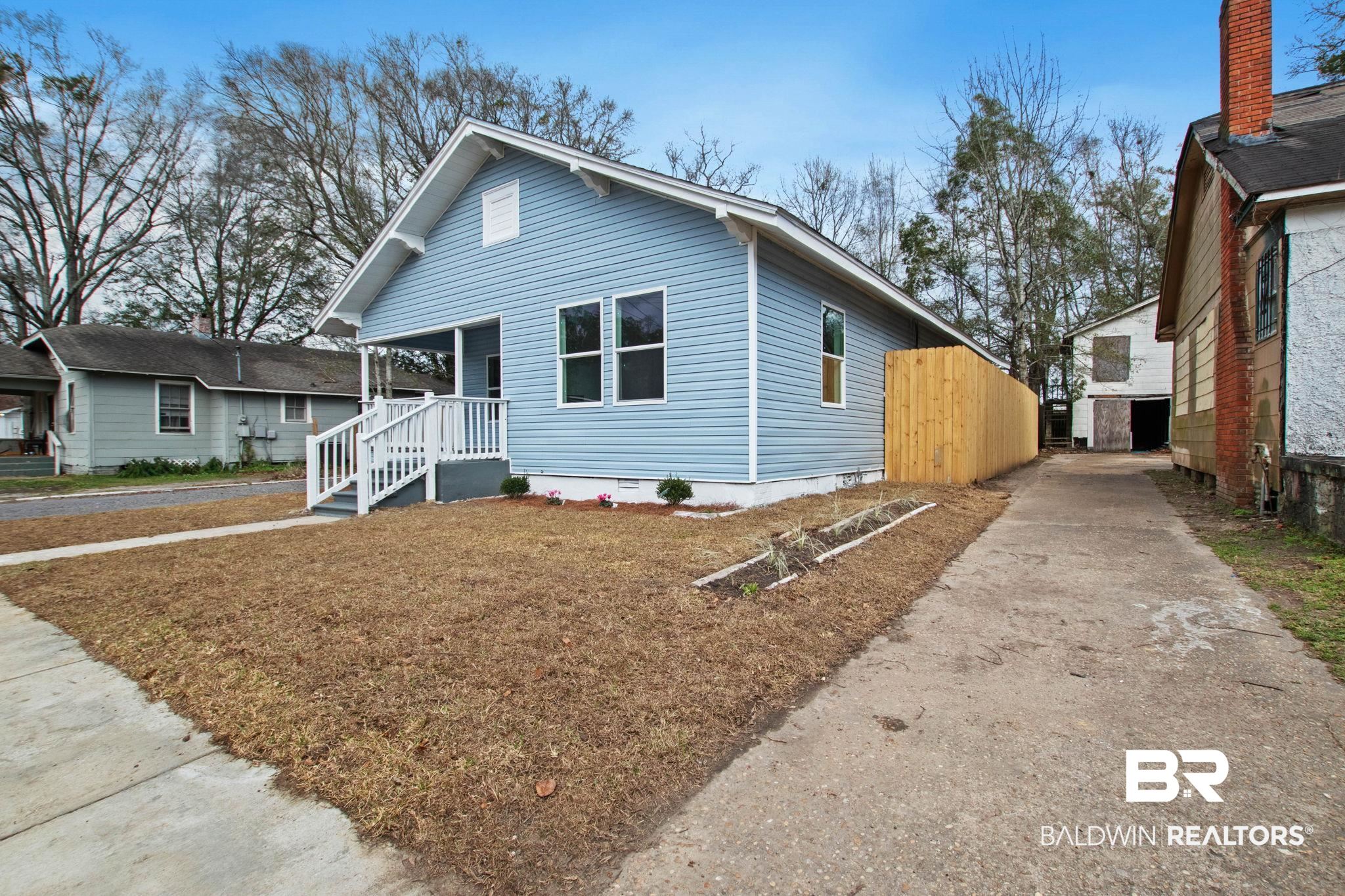 128 Bush Avenue Mobile, AL 36604 - Photo 2 of 40 Bungalow-style home with a porch, crawl space, and driveway