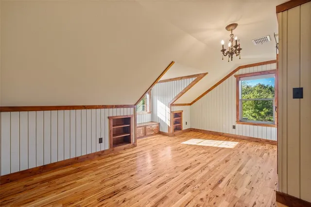 a house with trees in the background