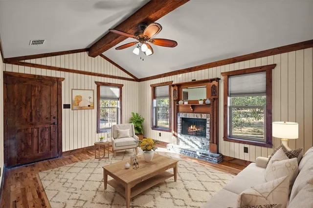 a bathroom with a granite countertop sink shower and a mirror