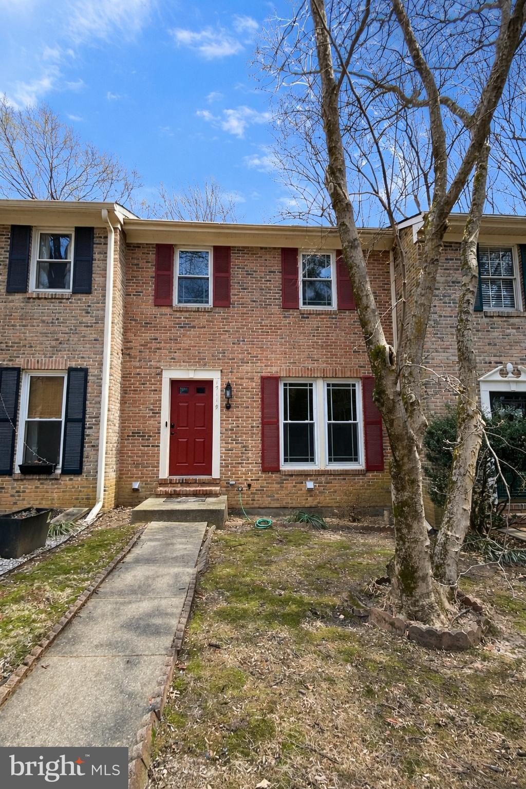 17119 Briardale Road Derwood, MD 20855 - Photo 1 of 1 Charming brick townhouse with vibrant accents.