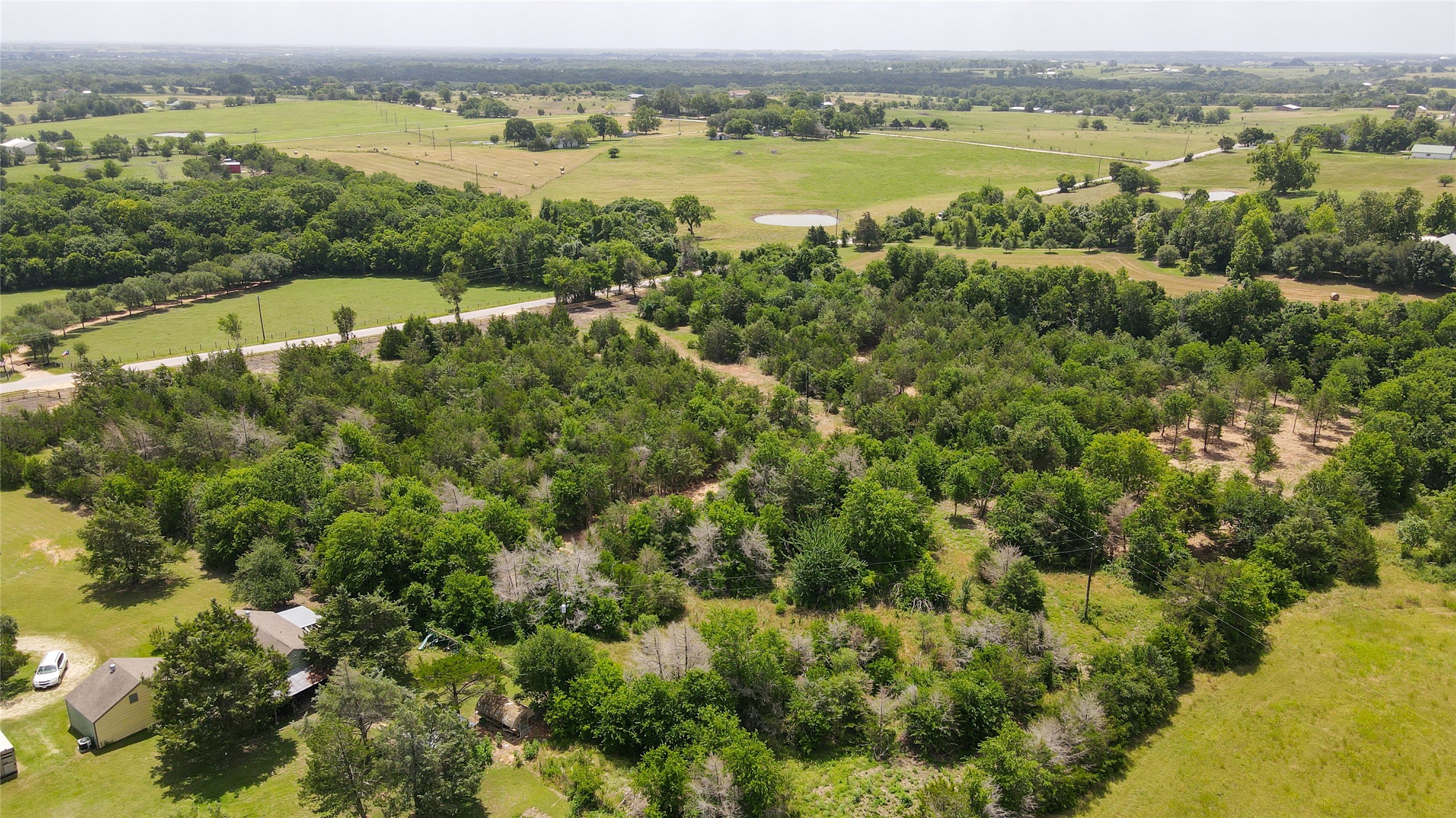 Lot 8 Wonder Hill Road Chappell Hill, TX 77426 - Photo 13 of 15 a view of a city with a lake view