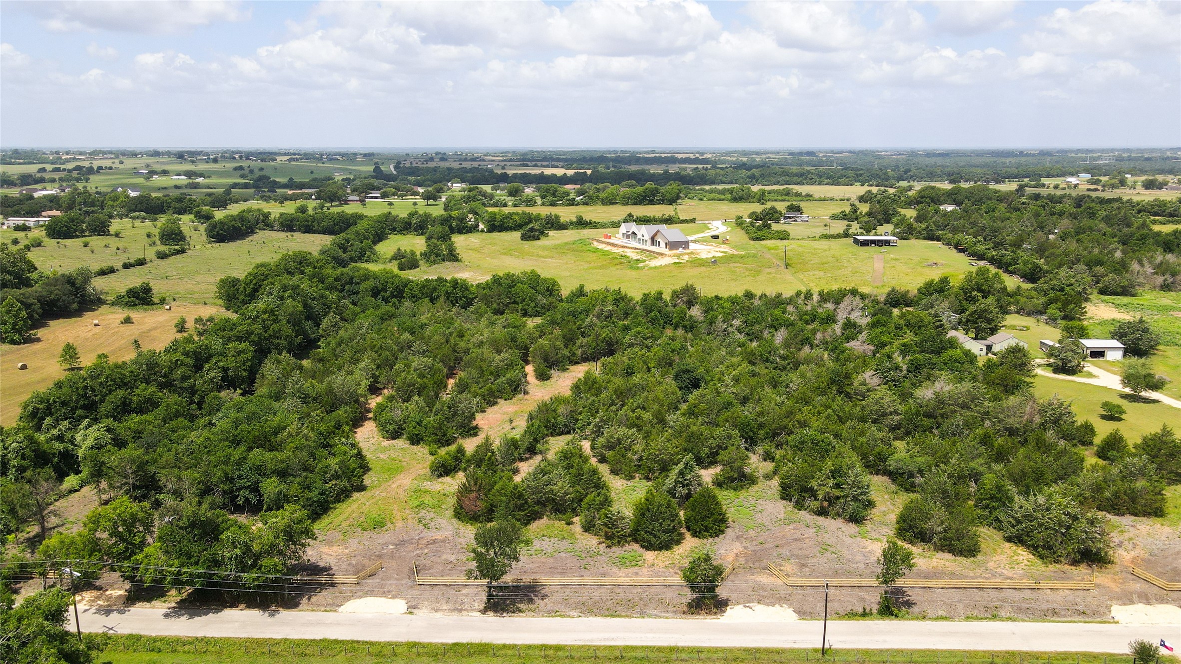 Lot 8 Wonder Hill Road Chappell Hill, TX 77426 - Photo 10 of 15 a view of city and ocean
