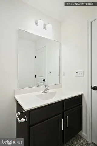 a sink with a mirror