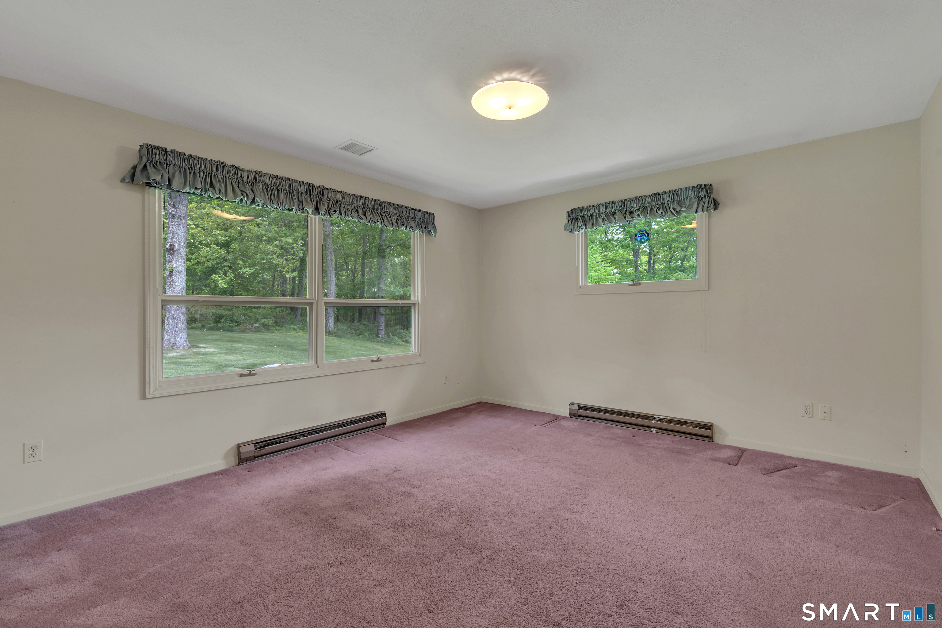 30 Maltbie Road Newtown, CT 06470 - Photo 31 of 40 an empty room with windows