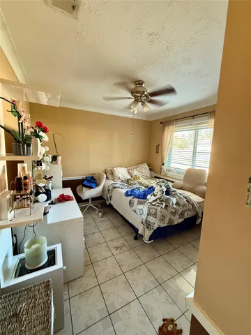 a bed room with a bed and a couch