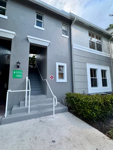 a view of outdoor space and front view of a house