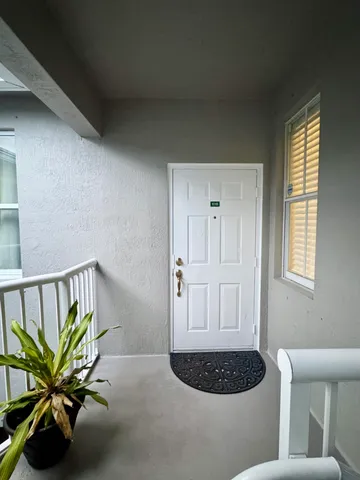 a view of a livingroom with furniture and window